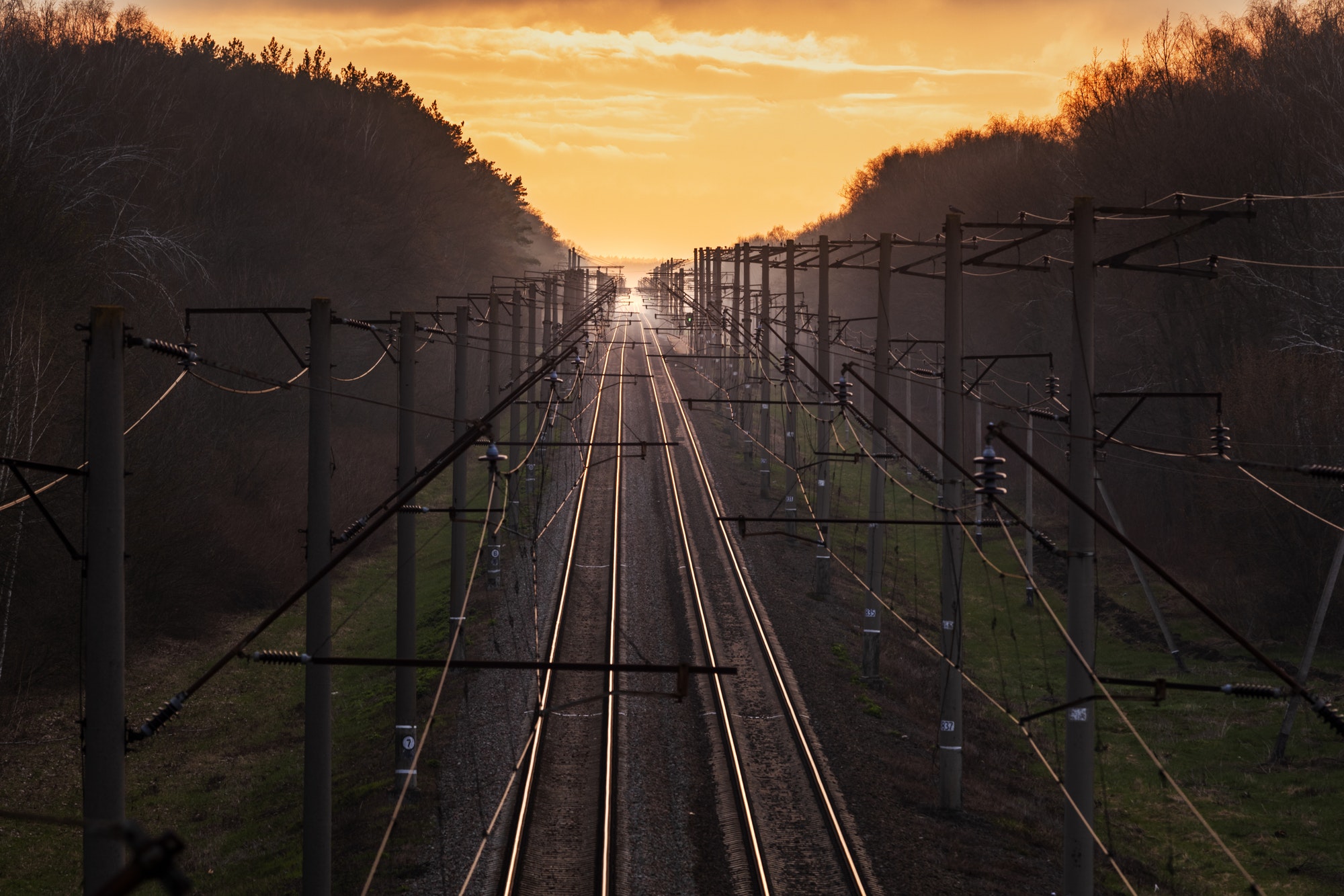 Railroad at sunset. Rail Freight and Passenger Transportation